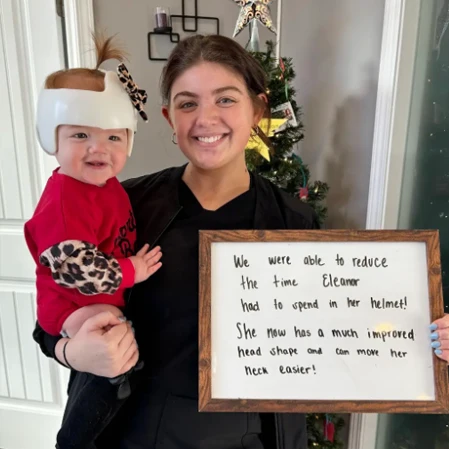 Dr. Jessica Ferguson smiling with a pediatrics patient.